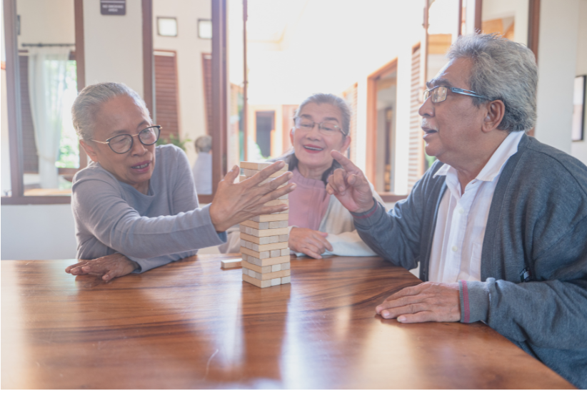 adults playing jenga