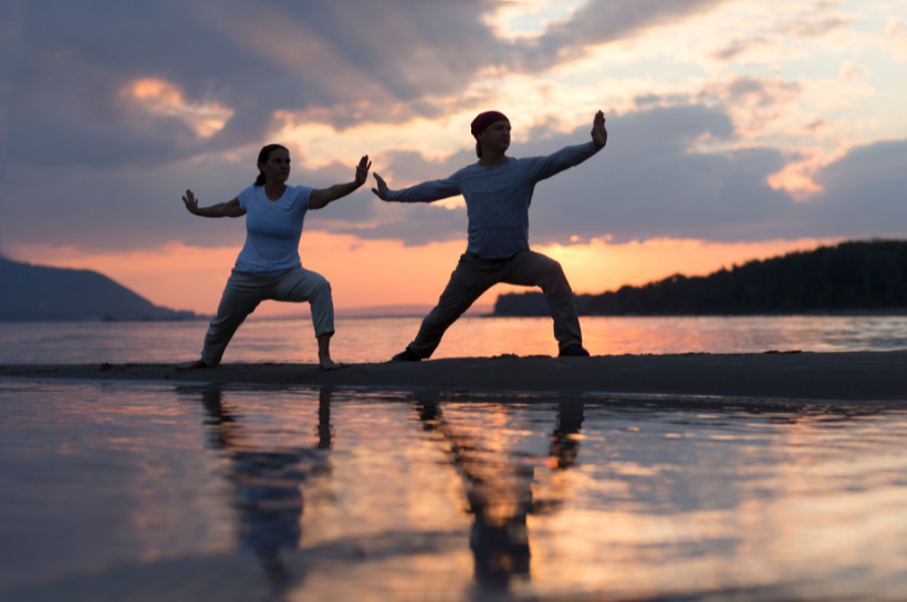 doing tai chi on the beach