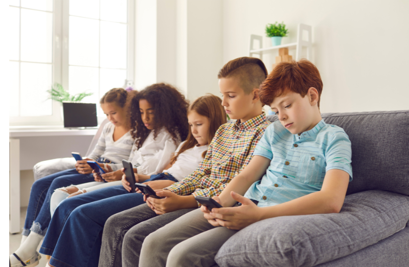 kids engrossed in tech