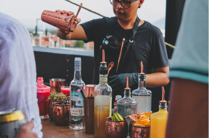 man making cocktails