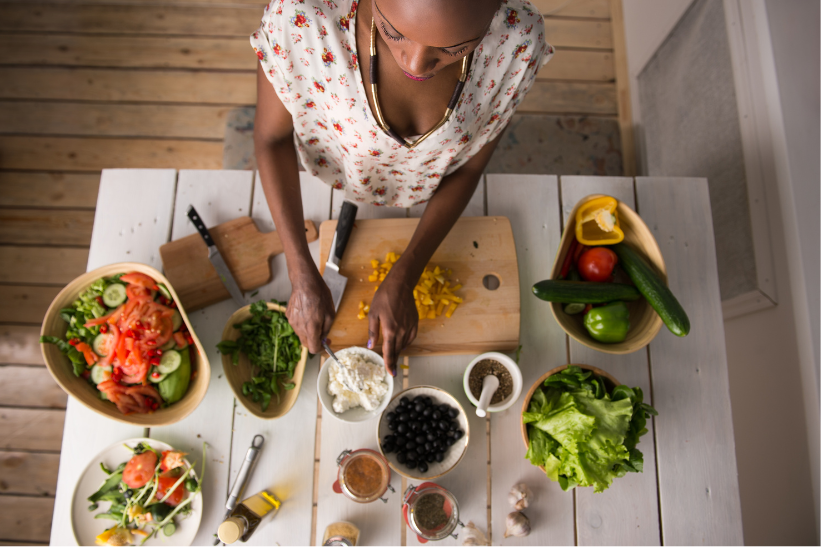 woman cooking with fresh ingredients