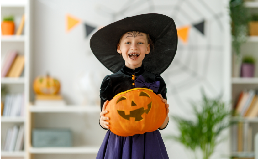 child dressed for halloween