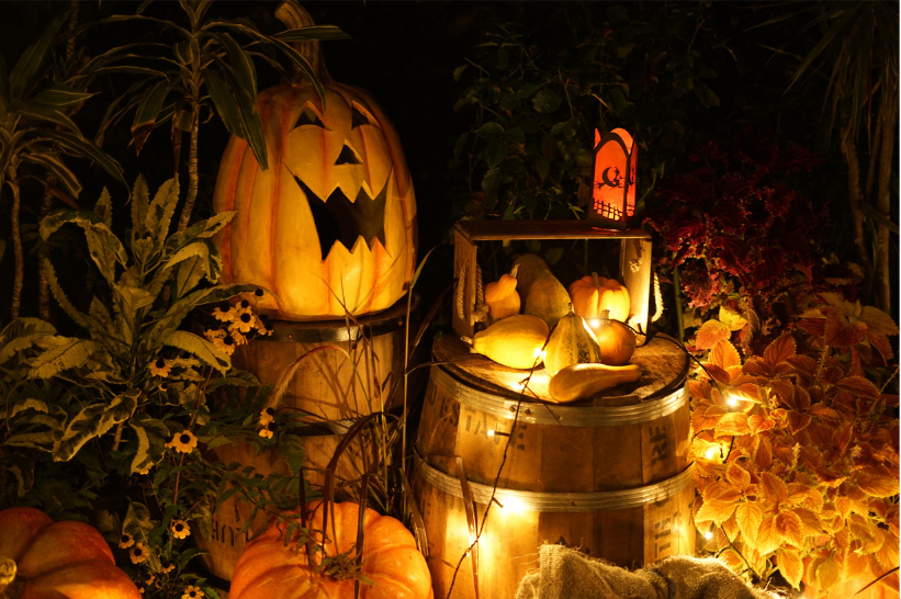 hallween decorations with pumpkin and candles
