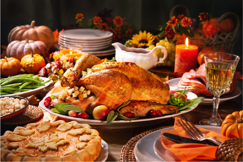 turkey on table with candles and pie
